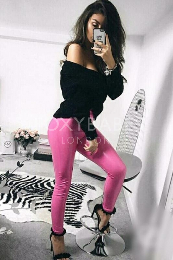 sexy girl with pink trousers and black top 